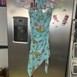 No tag but form fitting dress. If you are fit and young this dress is for you.